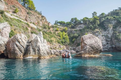 Red boat in cove